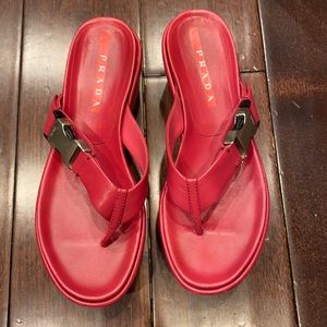 Prada fuschia platform thong slides.